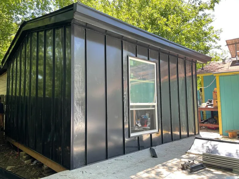 Black standing seam metal wall panels for Metal Roof Installation in New Scotland